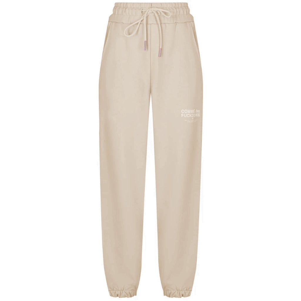 Comme Des Fuckdown – beige sweatpants – full-length front packshot with elastic cuffs