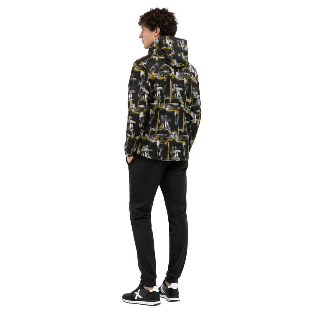 Moose Knuckles – Plamondon black hooded jacket – model wearing it, rear three-quarter view