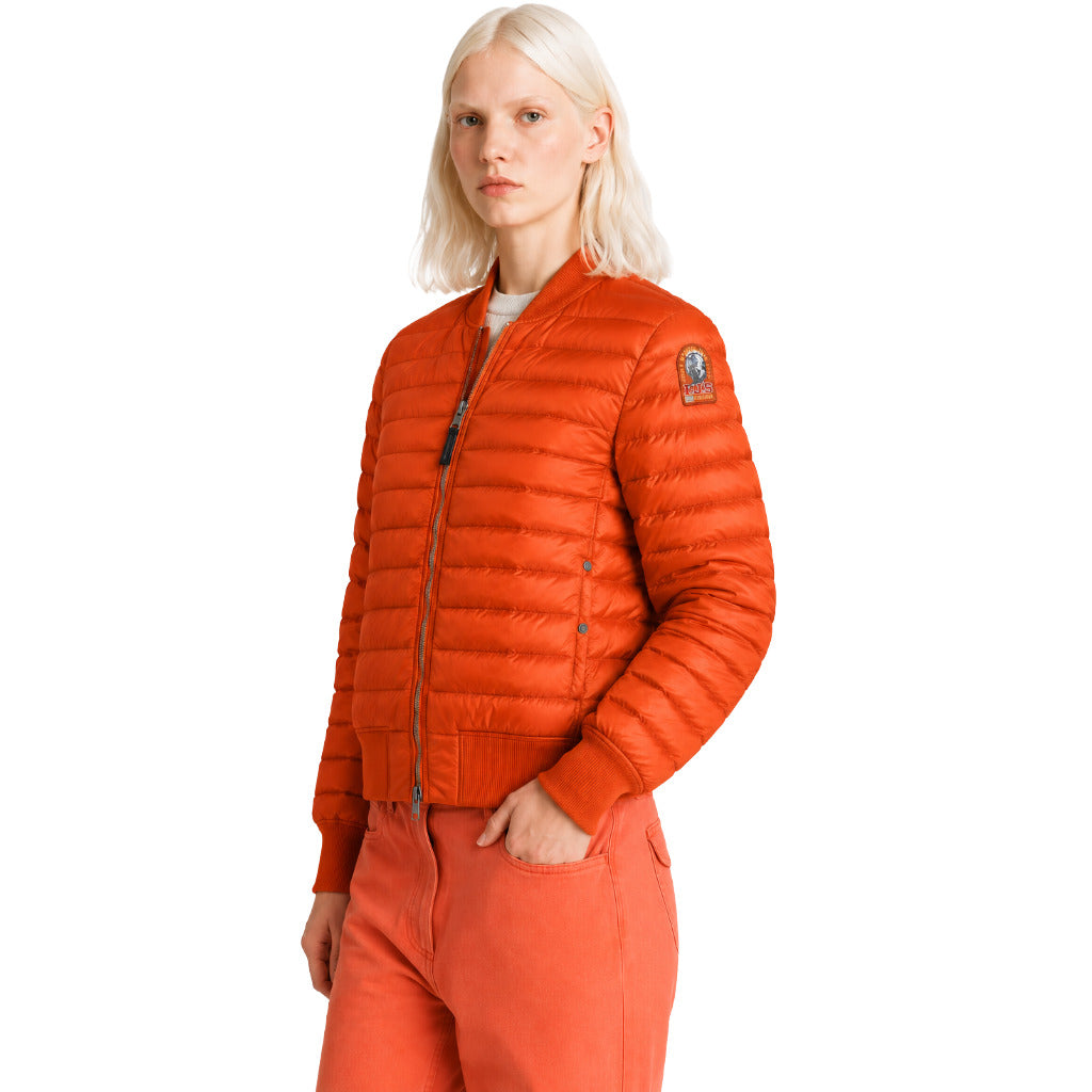 Parajumpers – Leila orange quilted down jacket – model wearing it, three-quarter view
