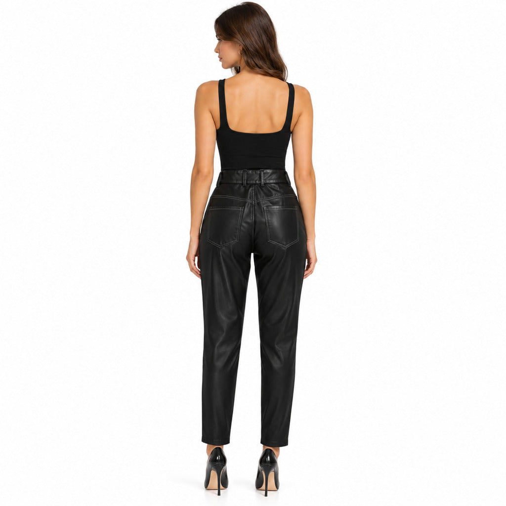 Dolce & Gabbana – black glossy trousers – model wearing them, rear view with back pockets