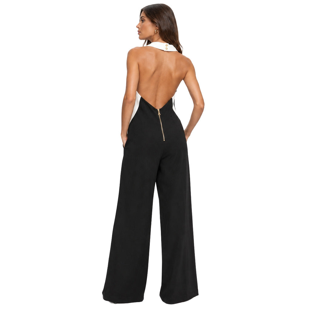 Balmain – black sleeveless jumpsuit – back view with open back, white straps and zipper