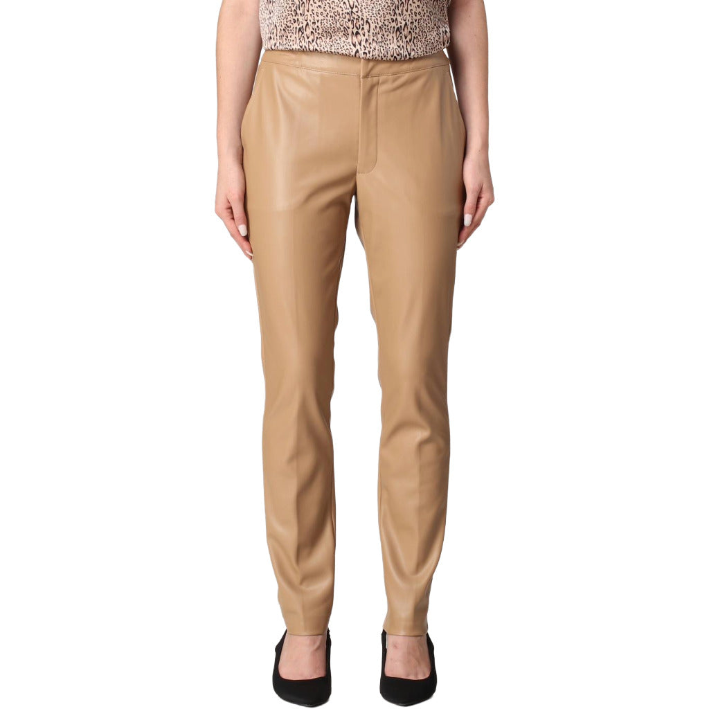 Twinset – beige faux leather trousers – worn front view with patterned top and black heels