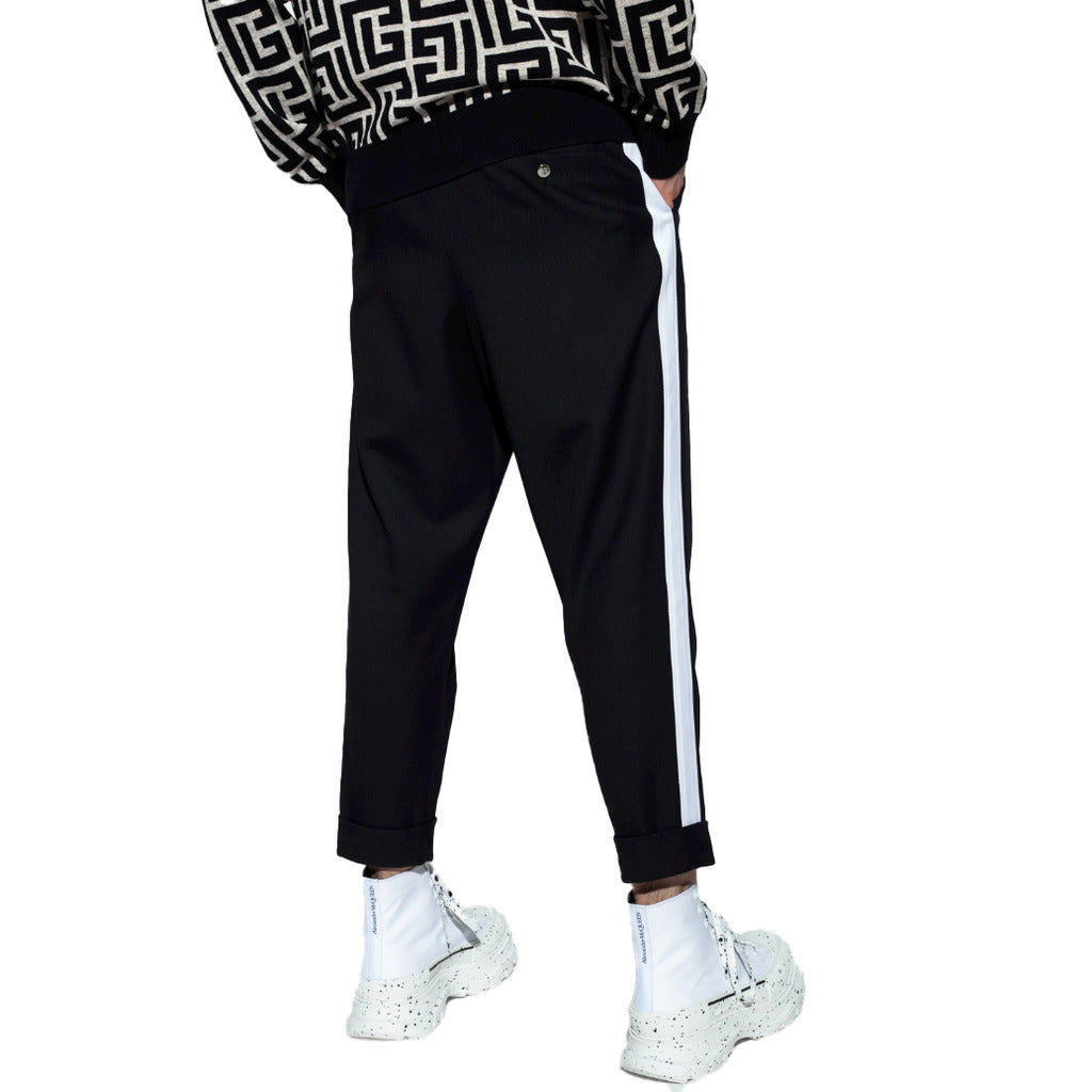 Balmain – black cotton trousers – rear view worn with white side stripe