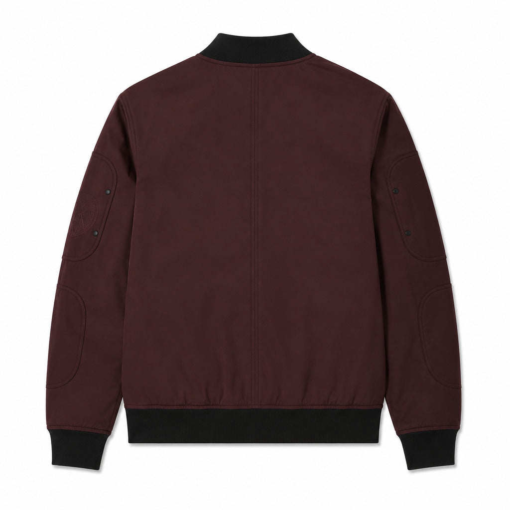 Moose Knuckles – burgundy jacket with black trim – back flat lay showing centre seam