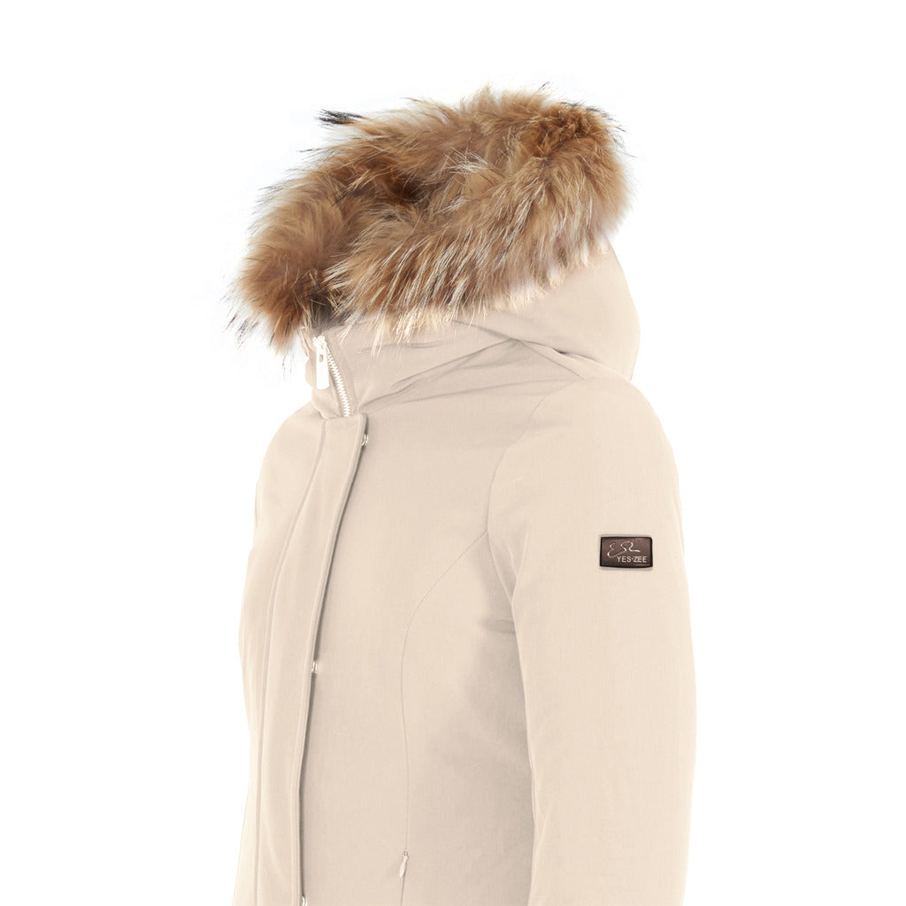 Yes Zee – white long puffer jacket with fur-trimmed hood – angled view showing sleeve label