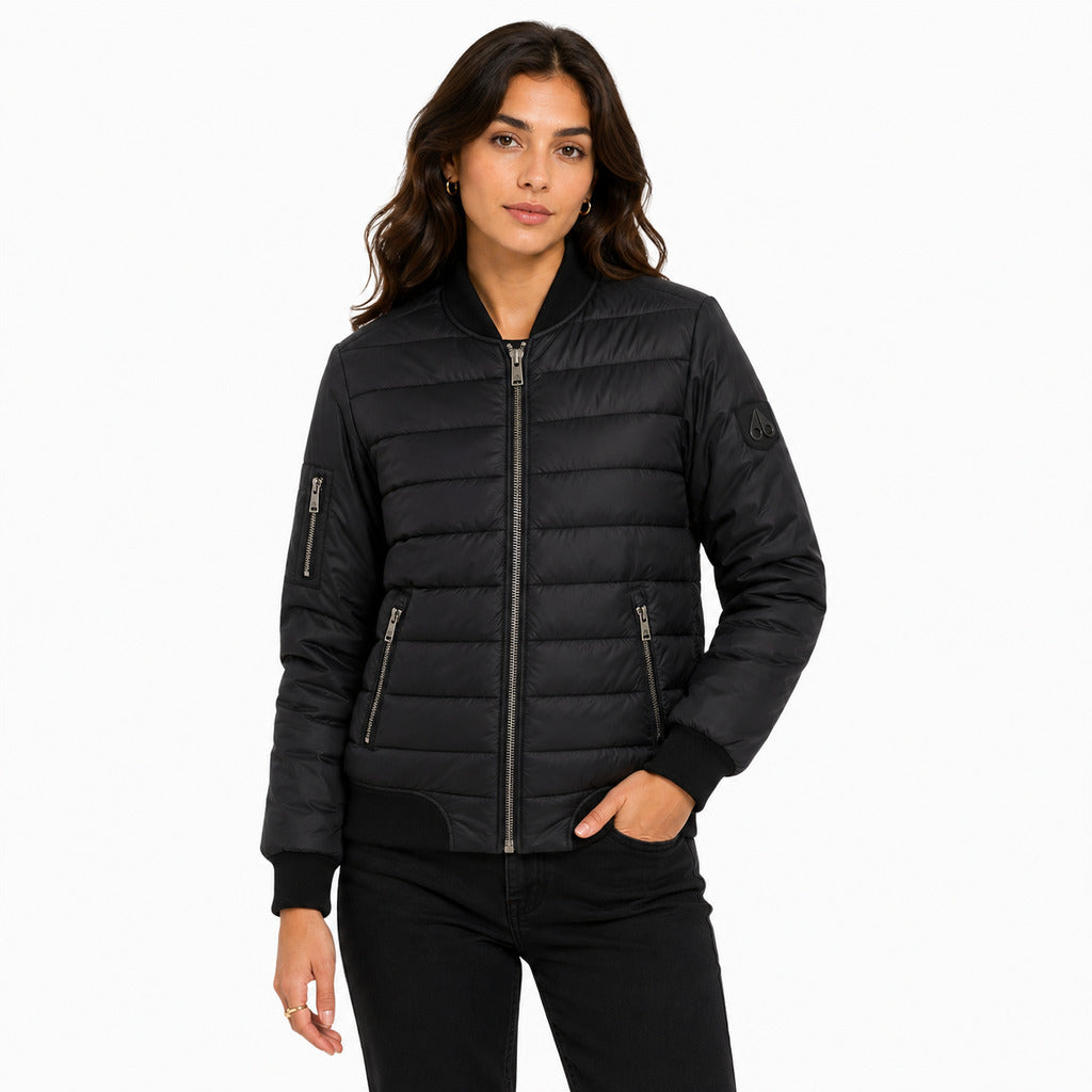 Moose Knuckles – black quilted down jacket – front view worn by model