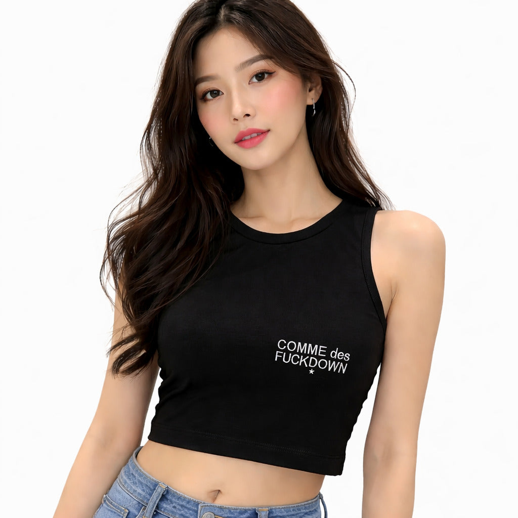 Comme Des Fuckdown – black cropped sleeveless top – front view worn with small chest logo