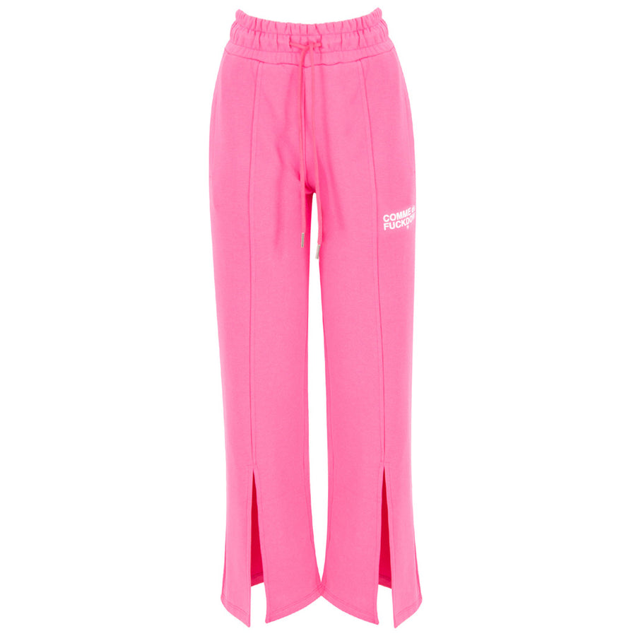 Comme Des Fuckdown – Trousers in Pink – Front view of pink trousers with split hems
