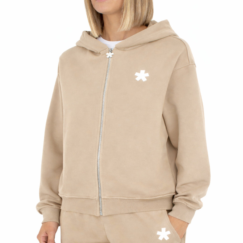 Comme Des Fuckdown – beige hooded zip-up sweatshirt – front view worn by model