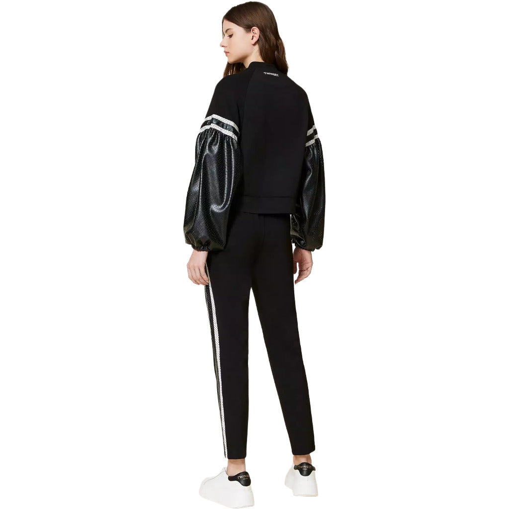 Twinset – black side-band trousers – rear three-quarter view worn with matching jacket