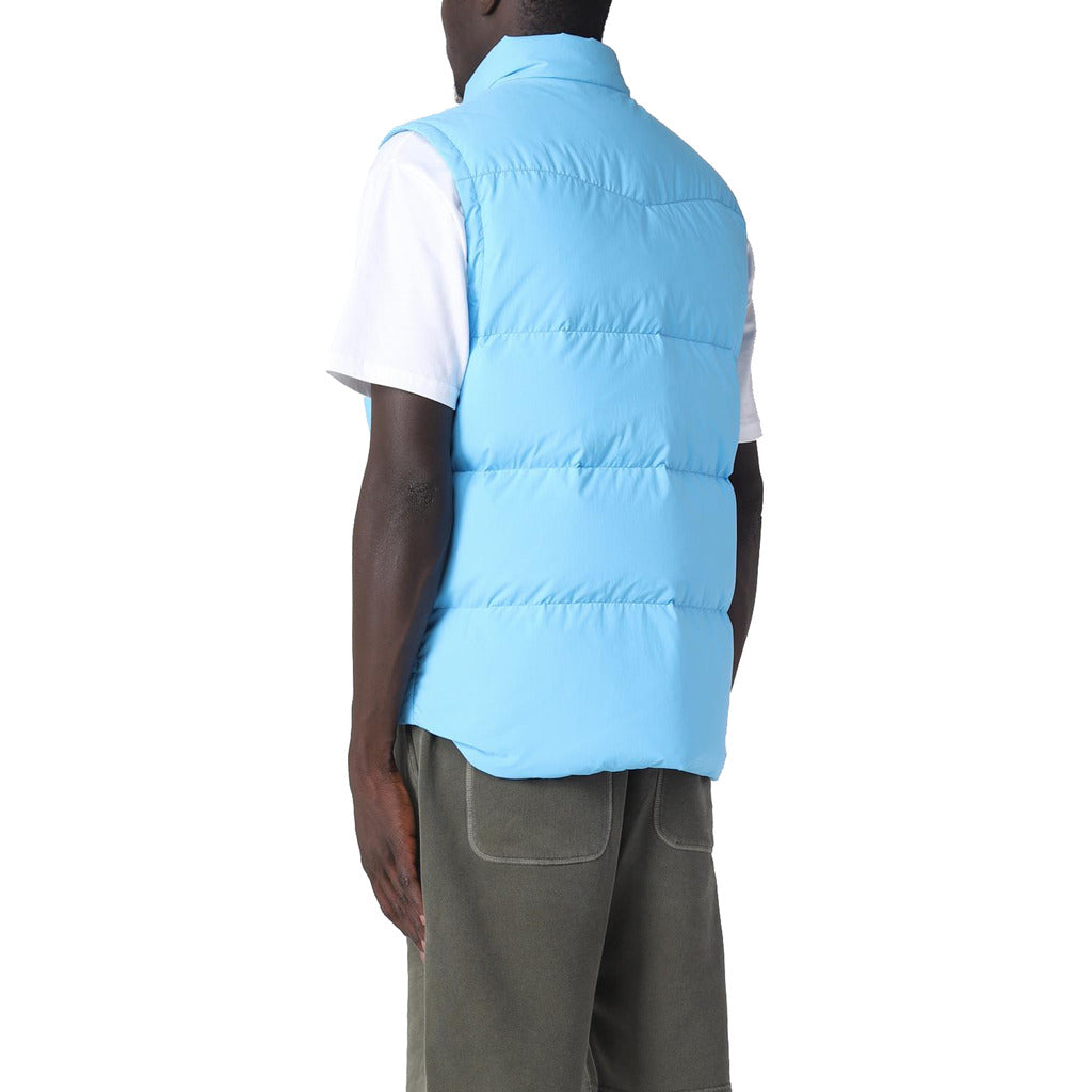 Woolrich – Down Vest – Light blue vest worn, rear three-quarter view