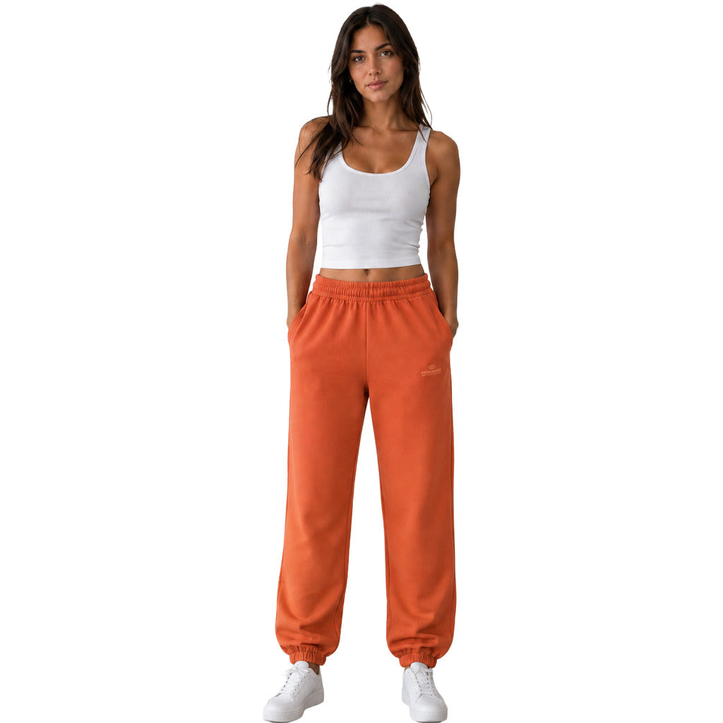 Parajumpers – Krizia tapered orange trousers – Front view on model with pockets and elasticated cuffs