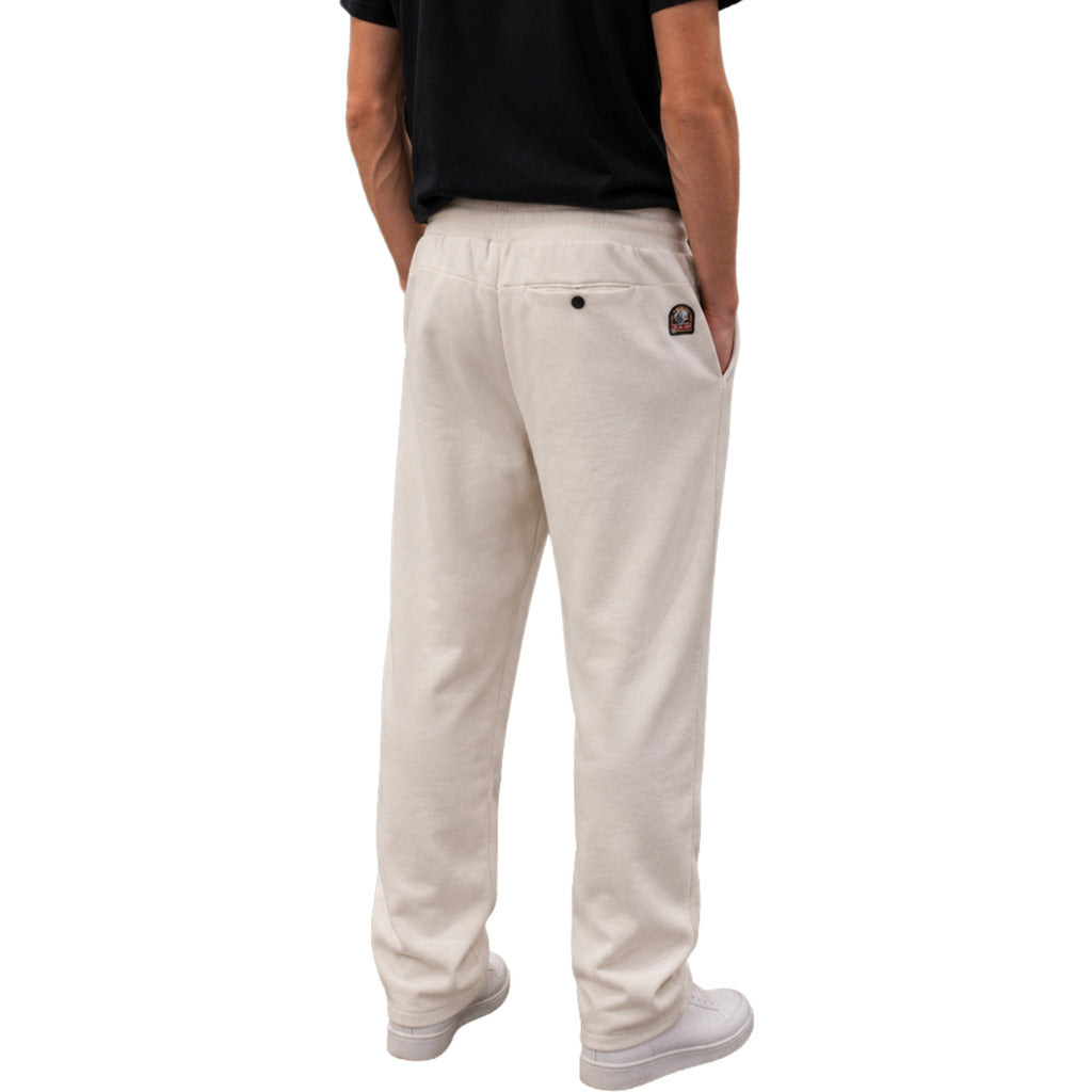 Parajumpers – white cotton trousers – rear three-quarter view with back pocket and logo patch
