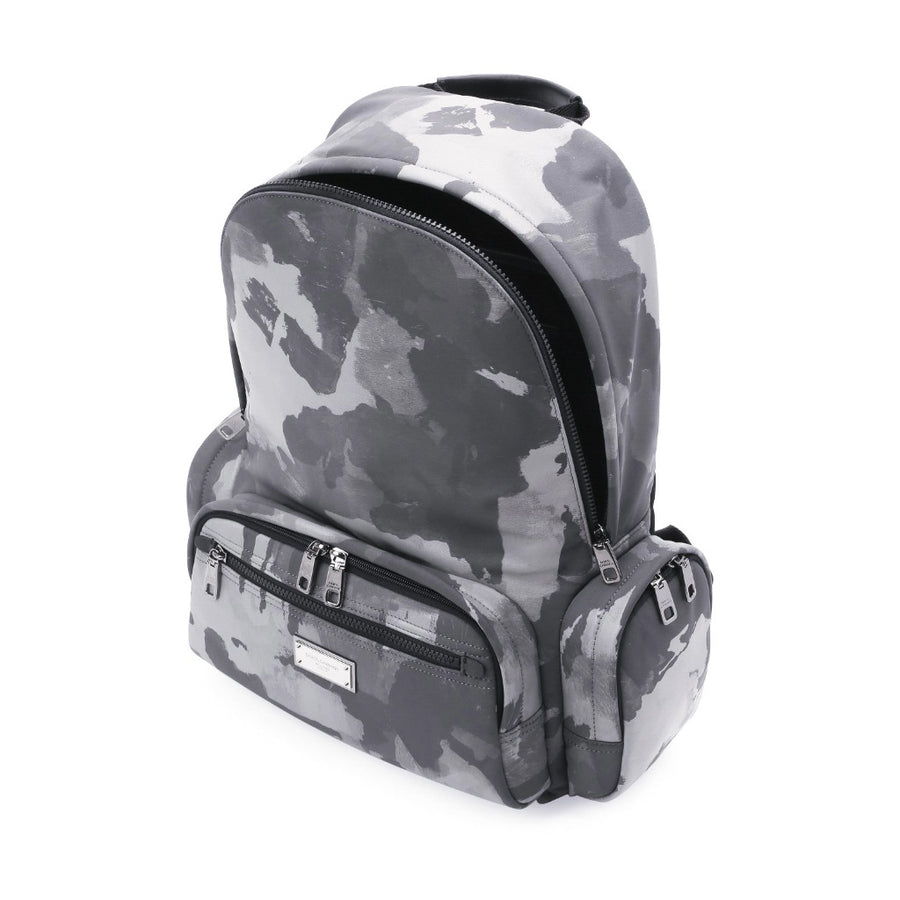 Dolce & Gabbana – Military camouflage backpack – front three-quarter view with multiple zipped pockets