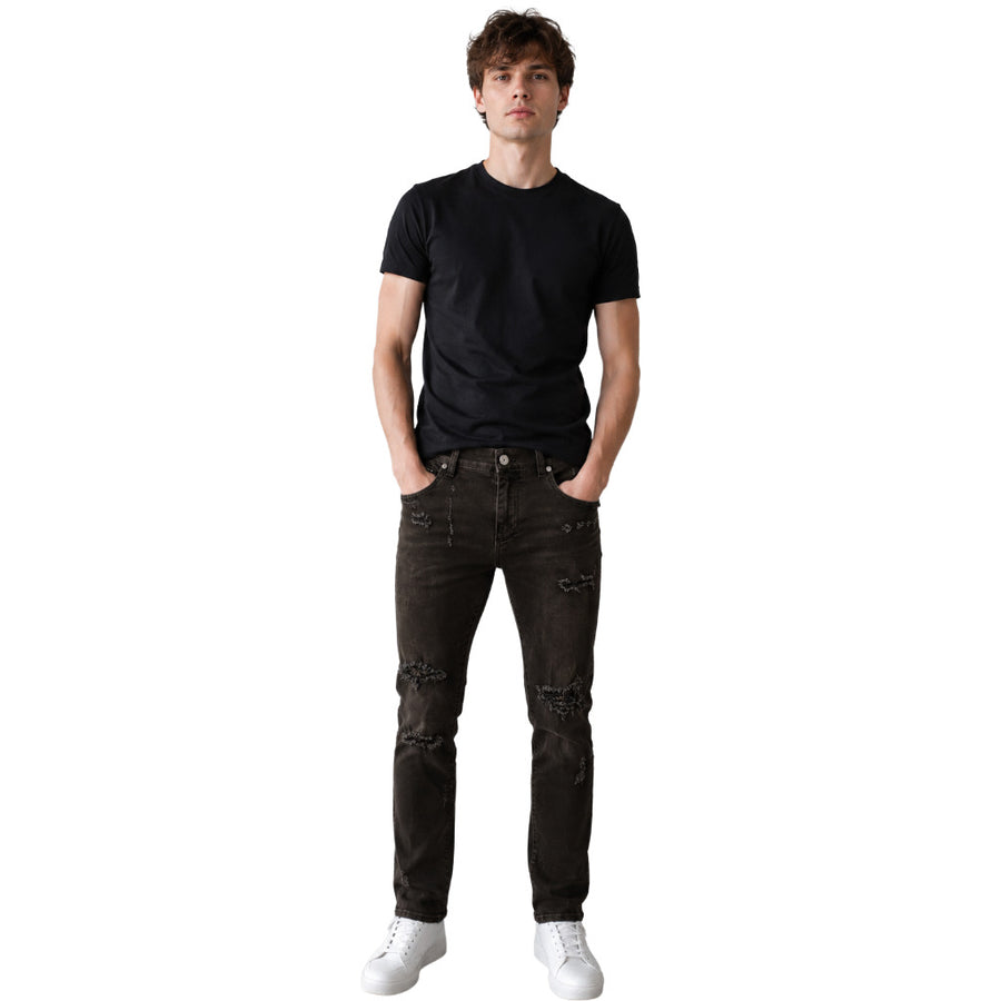 Dolce & Gabbana – black cotton skinny ripped jeans – front-facing full-body view on model