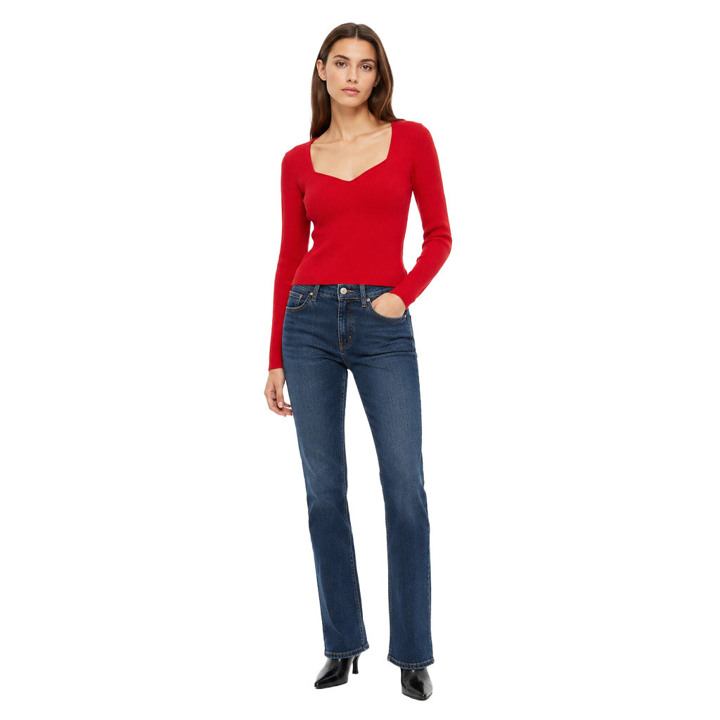 Pinko – red long-sleeve sweater with square neckline – front view worn with jeans