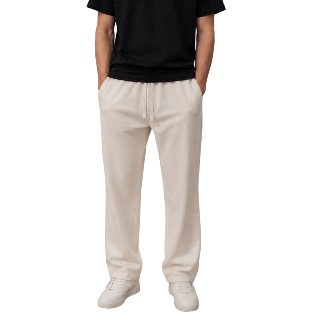 Parajumpers – white cotton trousers – front view with drawstring waist and straight legs