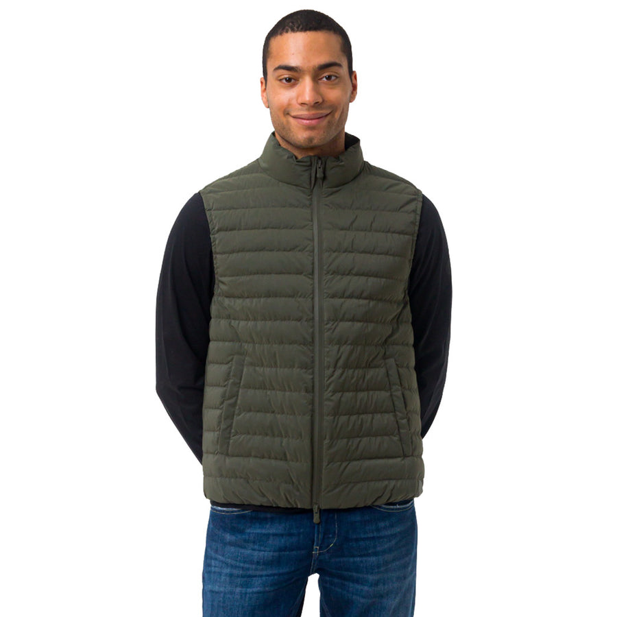 People Of Shibuya – Nobu Vest – Front view of a man wearing a dark green quilted vest