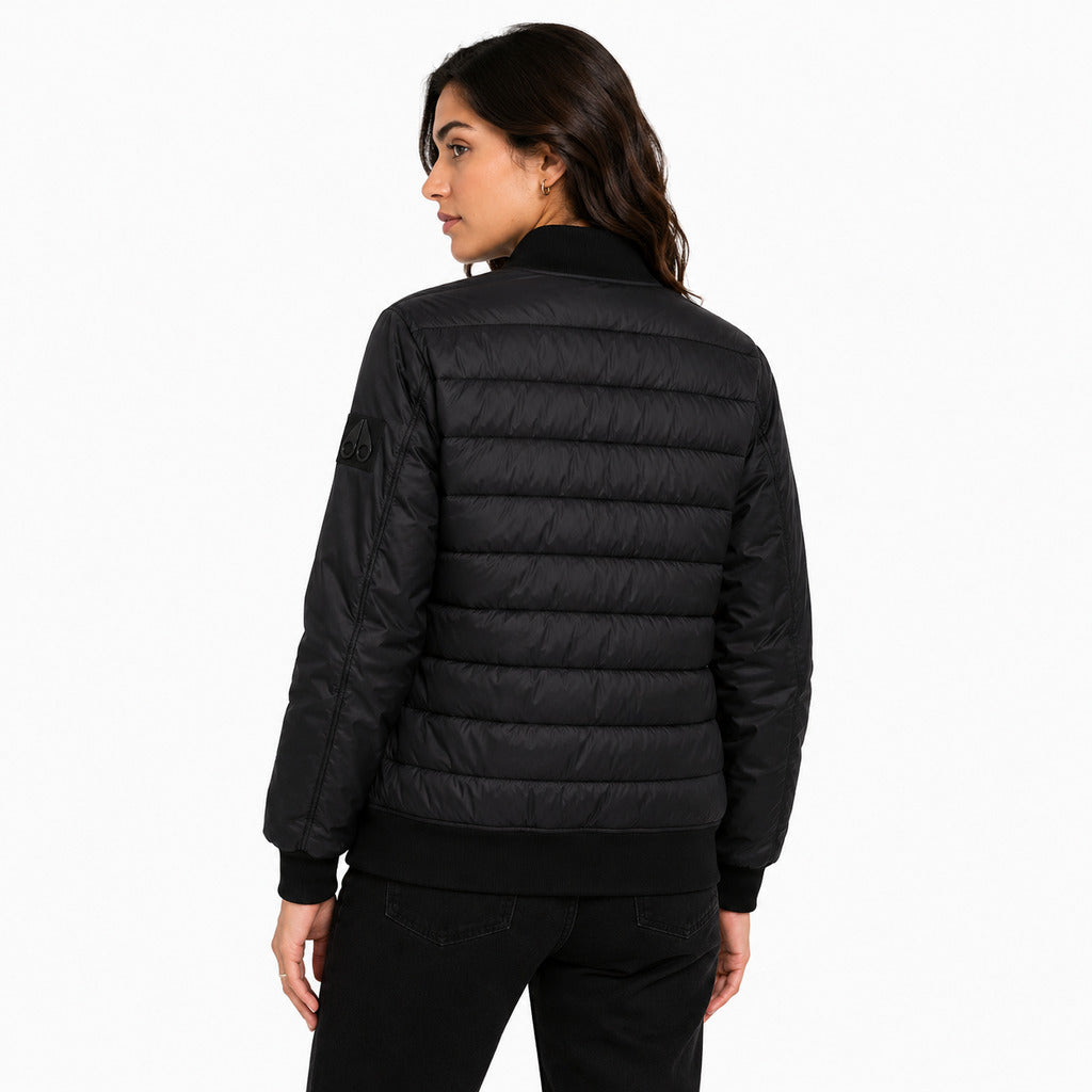 Moose Knuckles – black quilted down jacket – back view worn by model