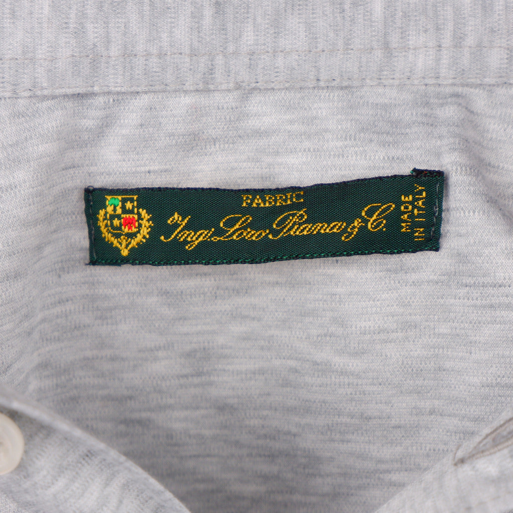 Loro Piana Tessuto – grey knit polo shirt – close-up of woven neck label