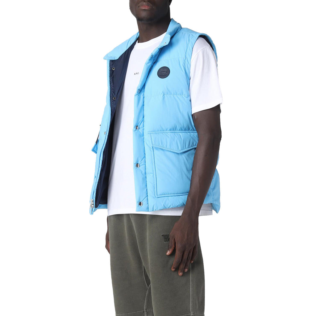 Woolrich – Down Vest – Model wearing light blue vest, open side view