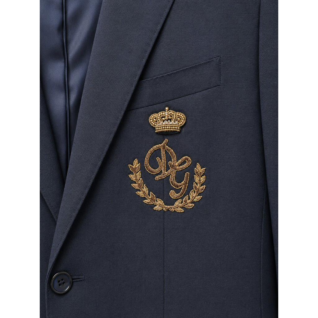 Dolce & Gabbana – blue single-breasted formal jacket – close-up of gold crest embroidery