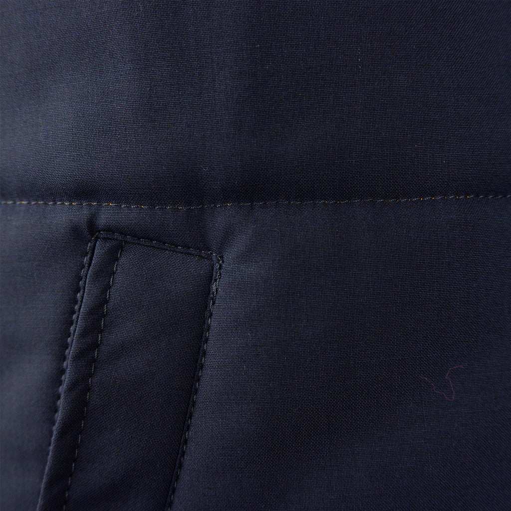 Loro Piana Tessuto – blue wool vest – close-up of fabric texture and pocket seam