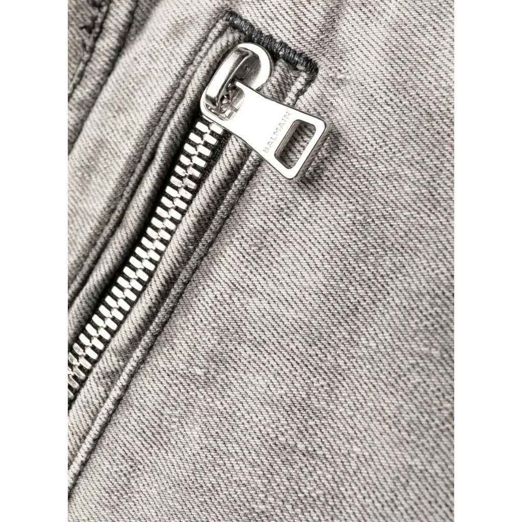 Balmain – grey slim-fit jeans – close-up of branded metal zipper on textured denim