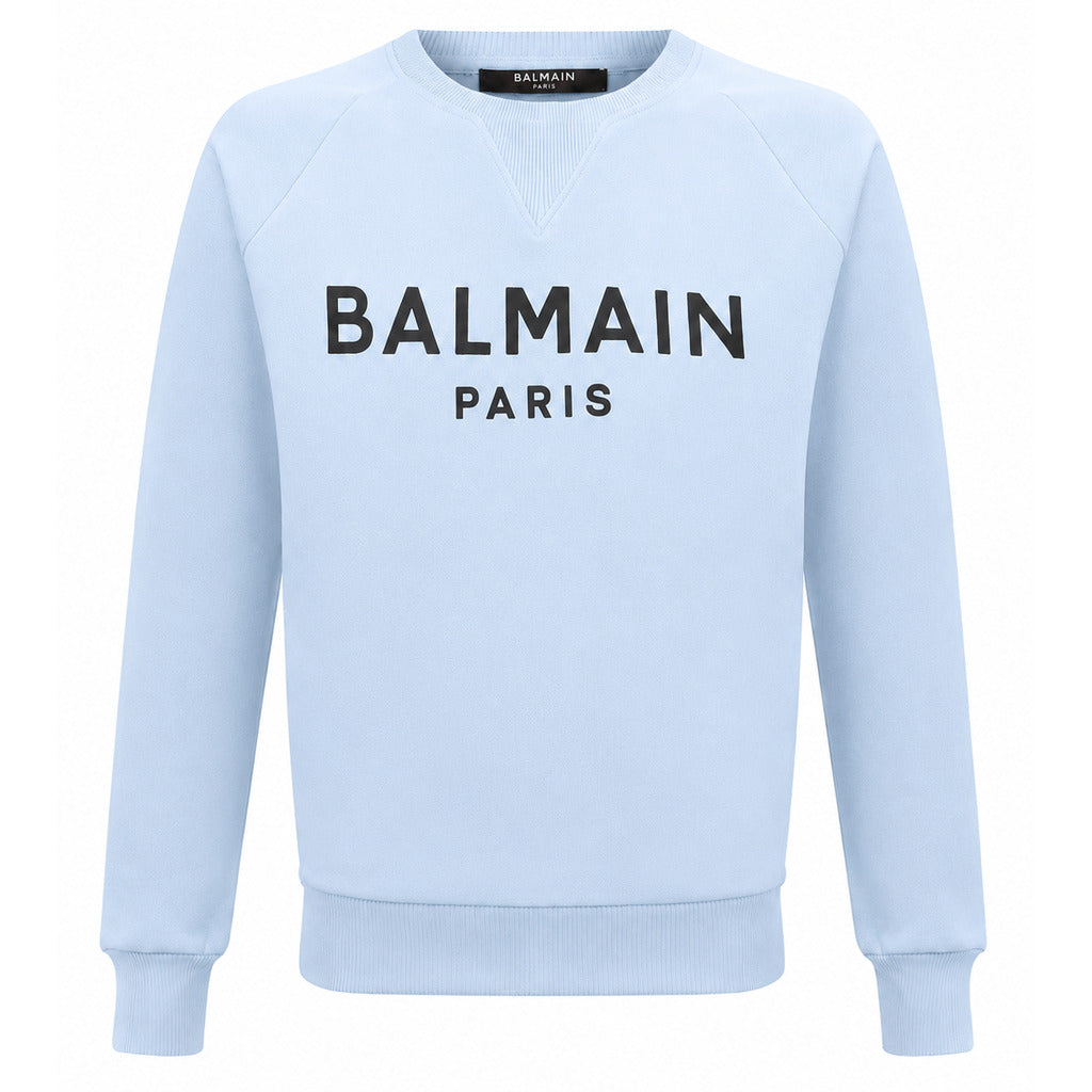 Balmain – light blue crewneck sweatshirt – front view with Balmain Paris logo and ribbed cuffs