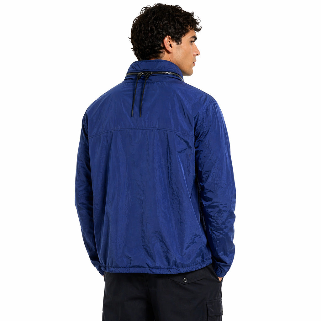 C.P. Company – Chrome Medium blue jacket – model shown from behind with raised collar