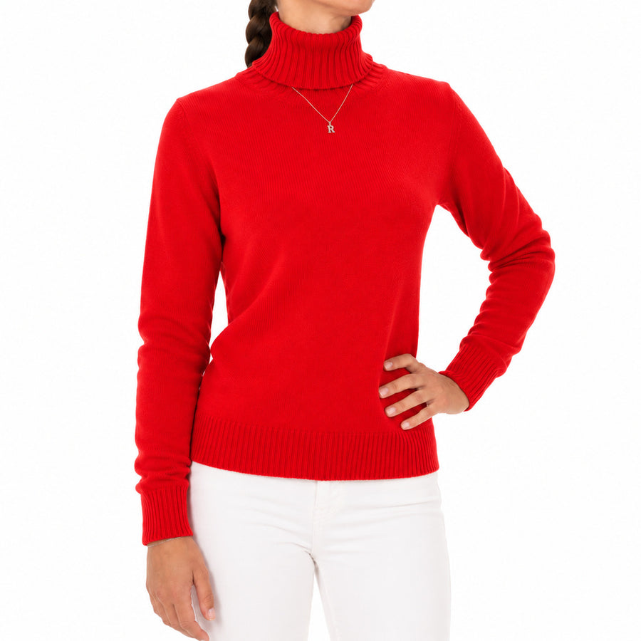Emilio Romanelli – red cashmere turtleneck sweater – front view worn with white trousers