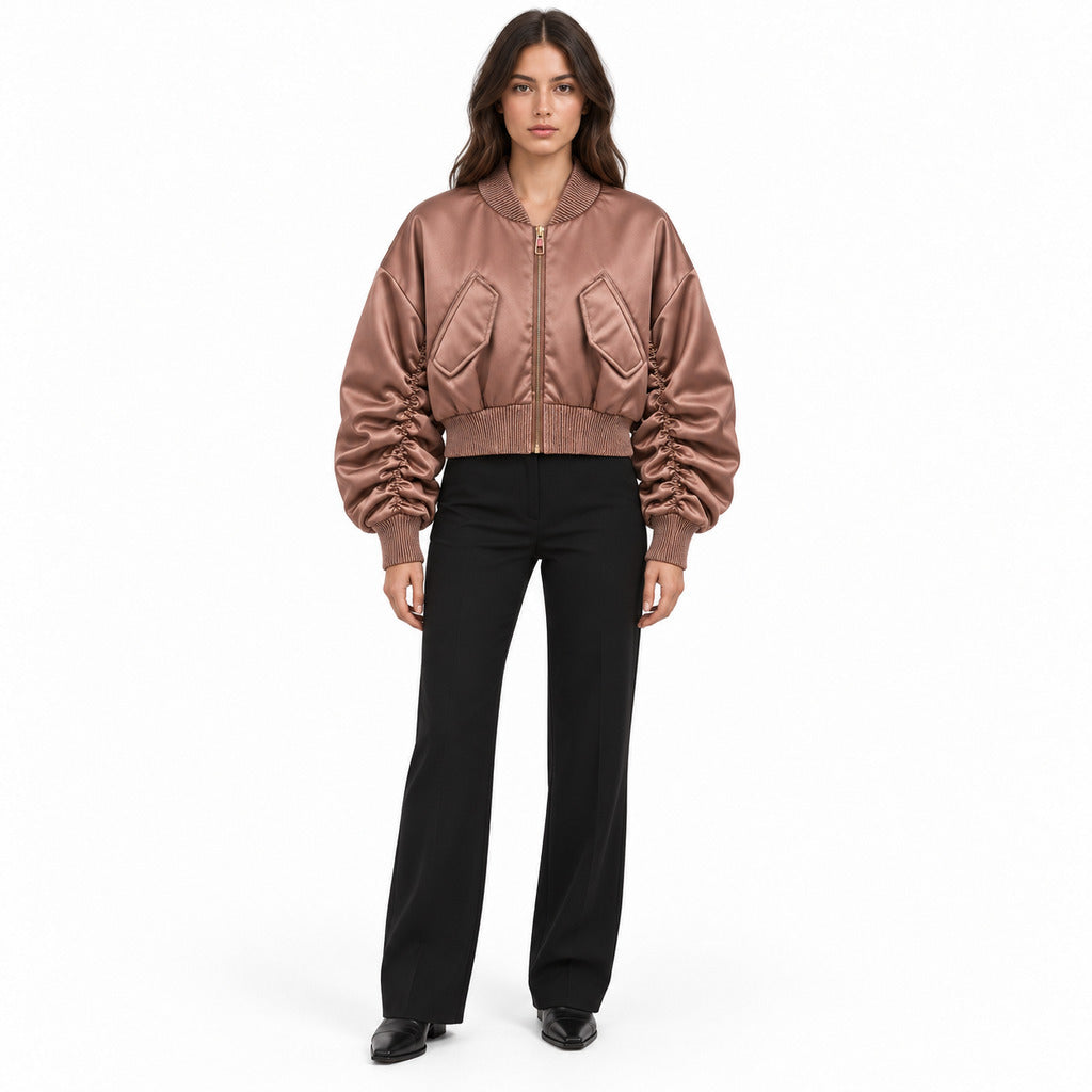 Dolce & Gabbana – brown pleated bomber jacket – front view worn with black trousers