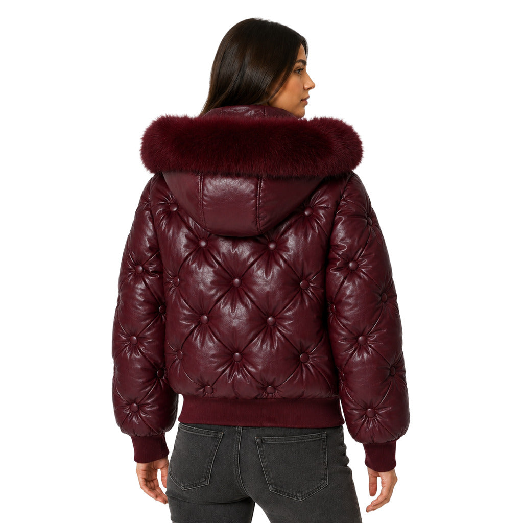 Moose Knuckles – purple padded jacket with fur-trimmed hood – model wearing it from behind