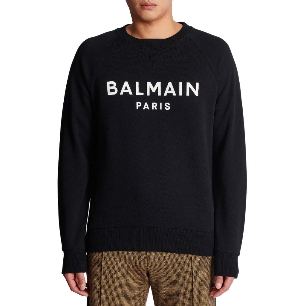 Balmain – black crewneck sweatshirt – worn front view with white chest lettering
