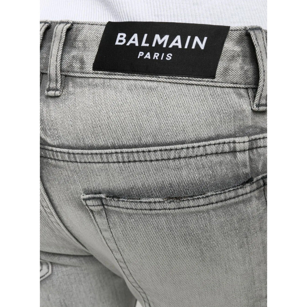 Balmain – grey slim-fit jeans – close-up of rear waistband label and pocket stitching
