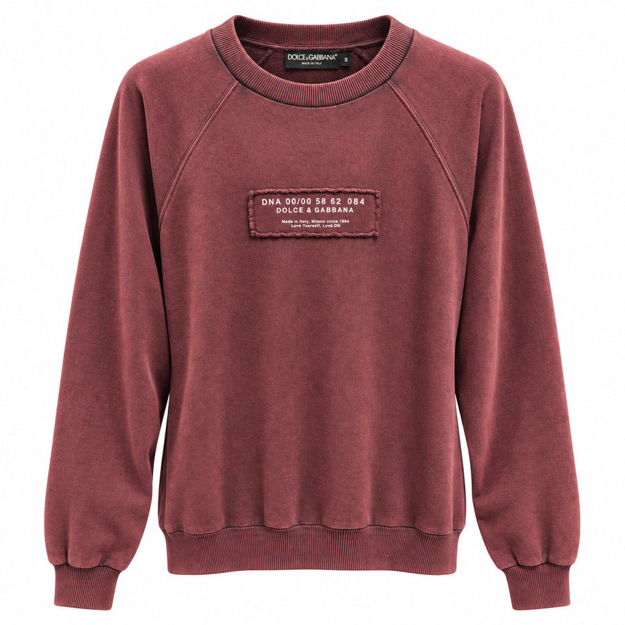 Dolce & Gabbana – burgundy crew-neck sweatshirt – front view with chest label
