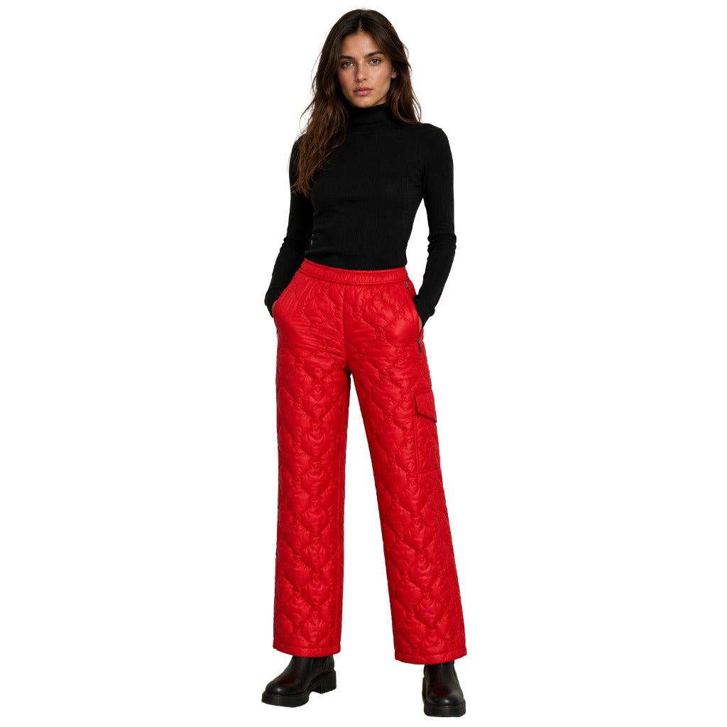 Parajumpers – red quilted wide-leg trousers – model wearing them with black boots
