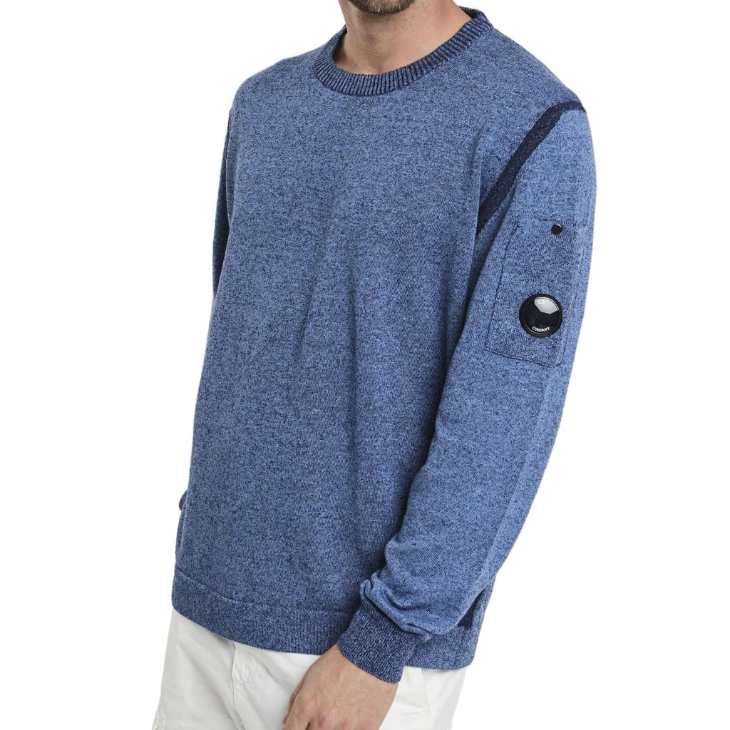 C.P. Company – light blue pocket sweater – three-quarter view worn with sleeve pocket and ribbed cuffs