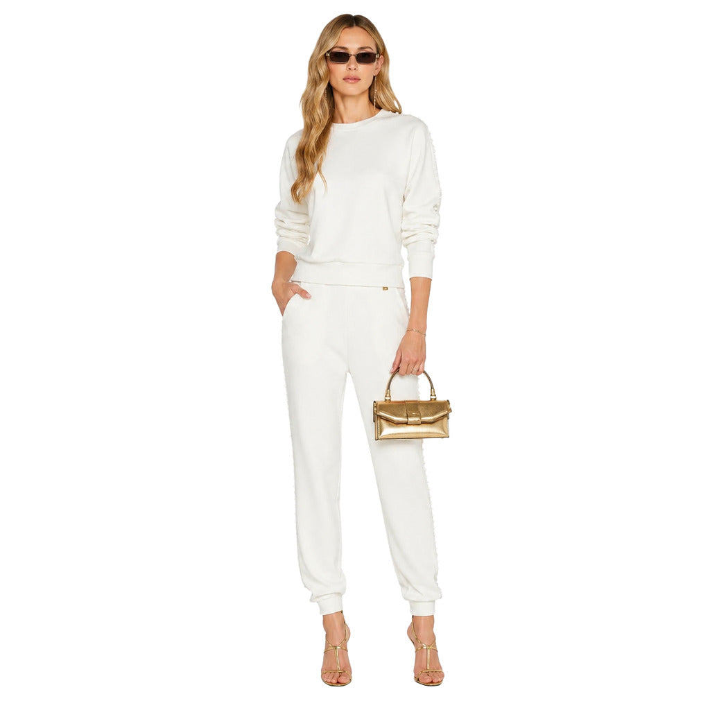 Patrizia Pepe – White track pants in a matching set – Front view worn with a white sweatshirt