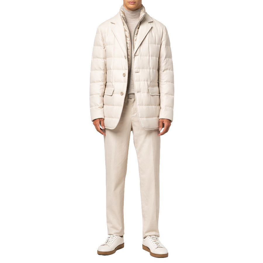 Herno – beige padded jacket with notched lapels – front view worn with trousers