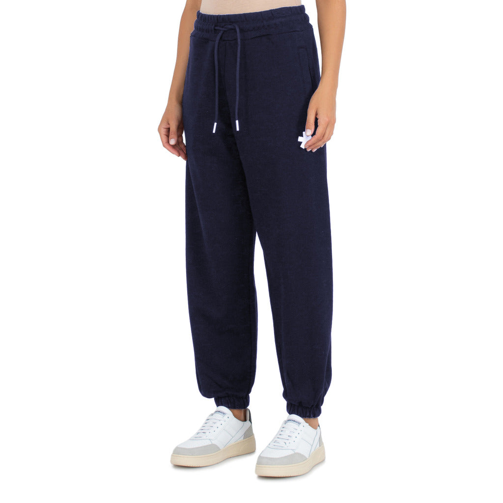 Comme Des Fuckdown – Printed Fleece Pants – Front view worn in navy with drawstring and elastic cuffs