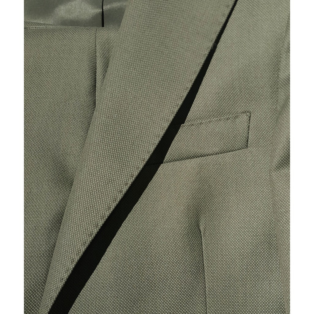 Ermenegildo Zegna Tessuto – green wool suit – lapel and pocket detail close-up