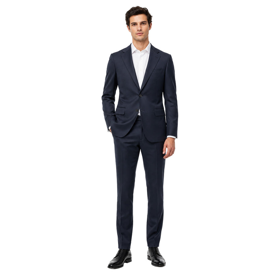 Ermenegildo Zegna Tessuto – dark blue wool suit – front view worn with white shirt