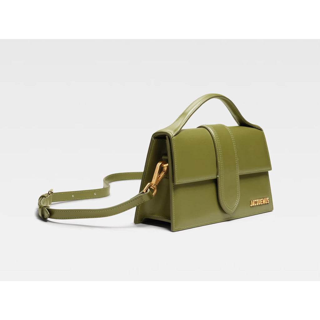 Jacquemus – Le Grand Bambino Shoulder Bag – angled front view with long strap laid out