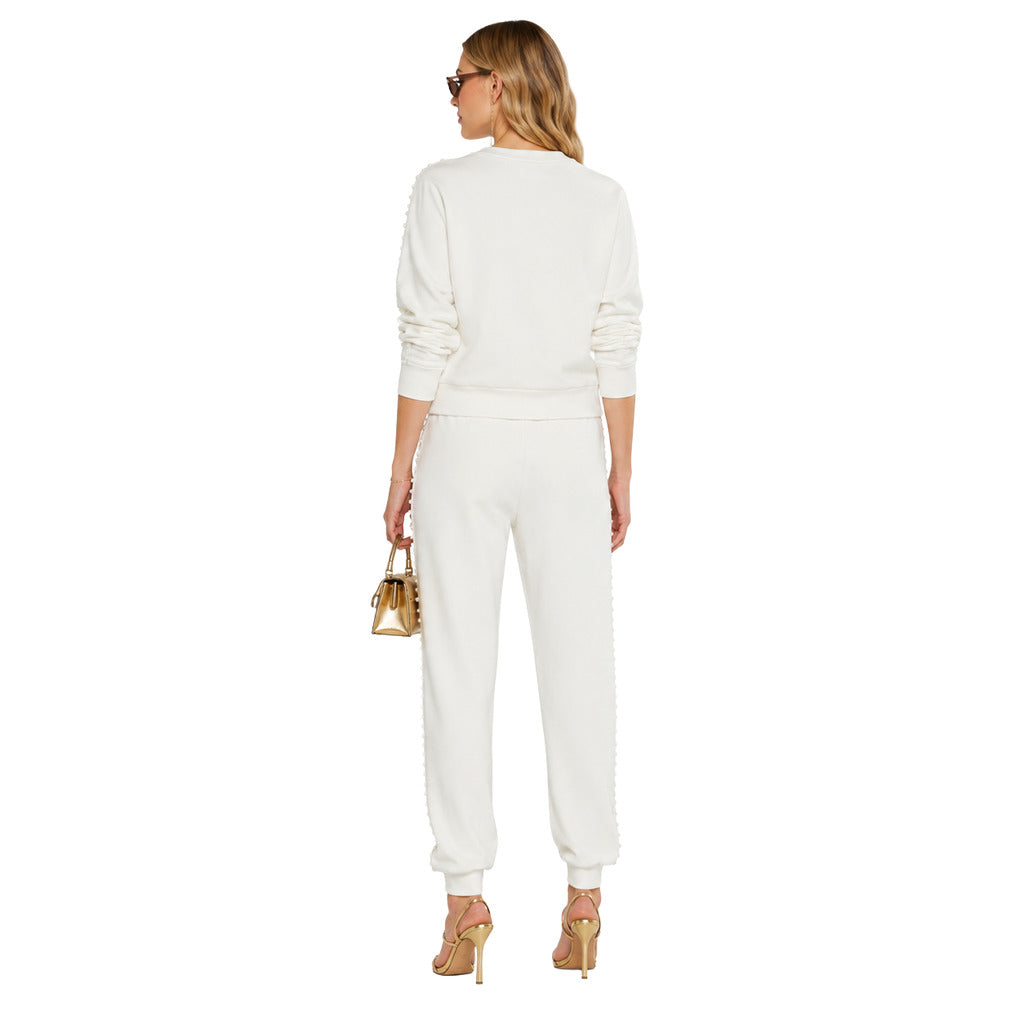 Patrizia Pepe – White track pants in a matching set – Back view worn with a white sweatshirt