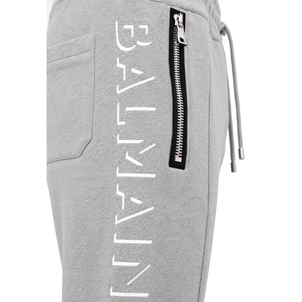 Balmain – heather grey cotton joggers – close-up of side zipper, lettering and fabric