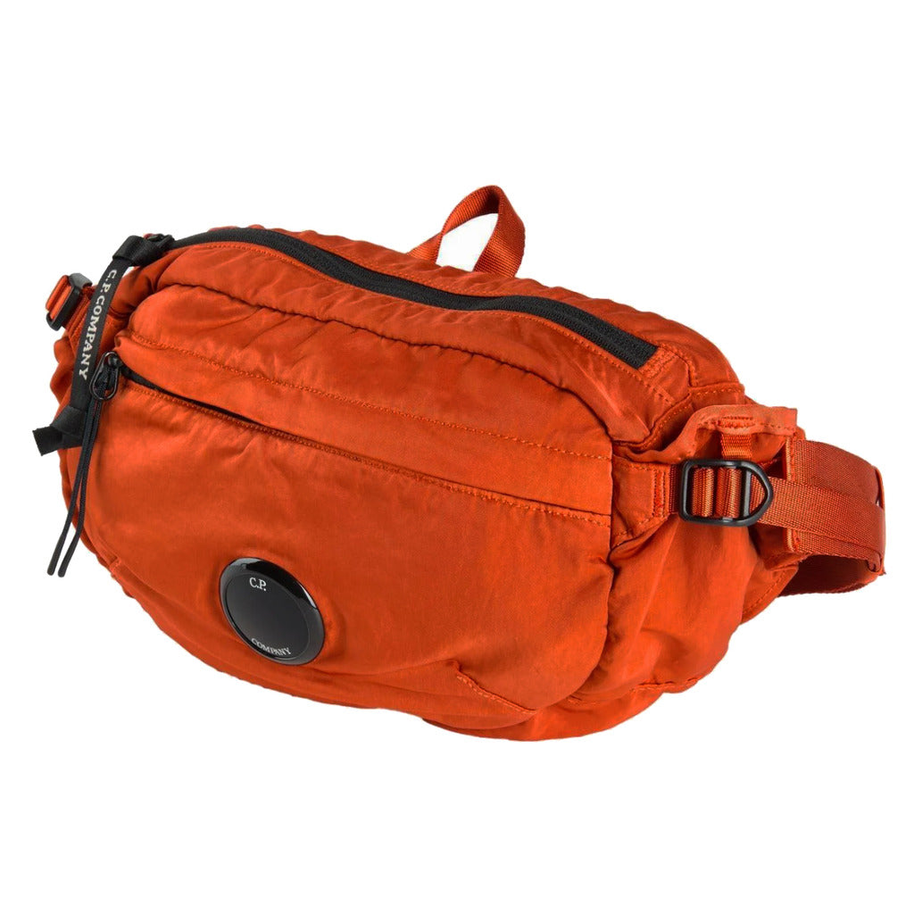 C.P. Company – orange nylon blend belt bag – angled view showing black zips and buckle
