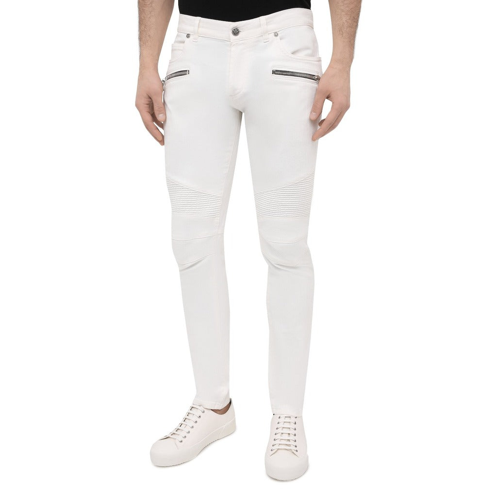 Balmain – white slim-fit jeans – front view worn with white sneakers