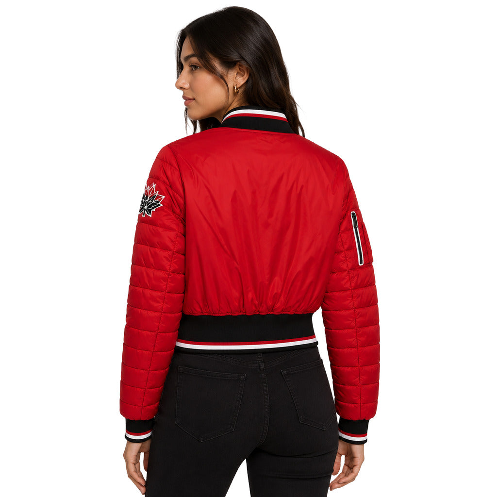 Moose Knuckles – red cropped down jacket – model wearing it, back view with sleeve patch