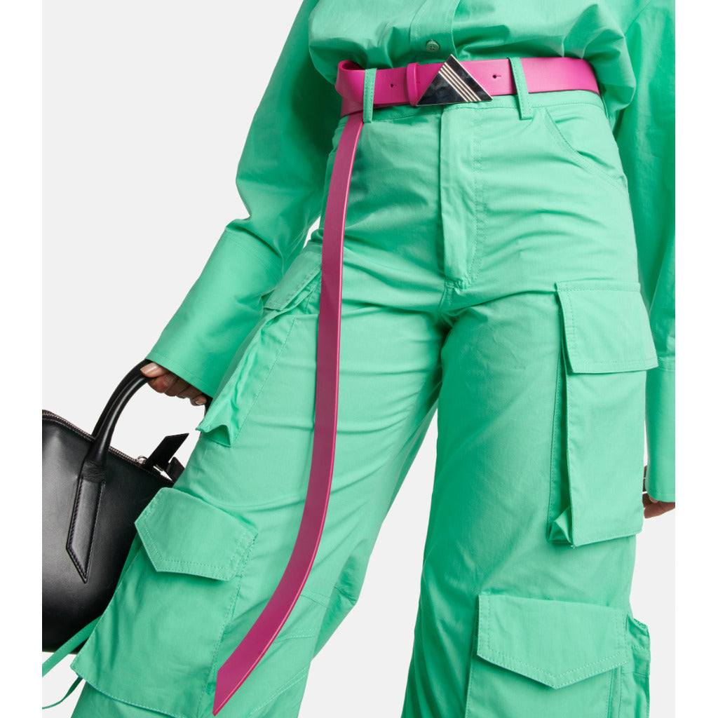 The Attico – fuchsia leather belt with triangular buckle – worn with mint-green cargo trousers